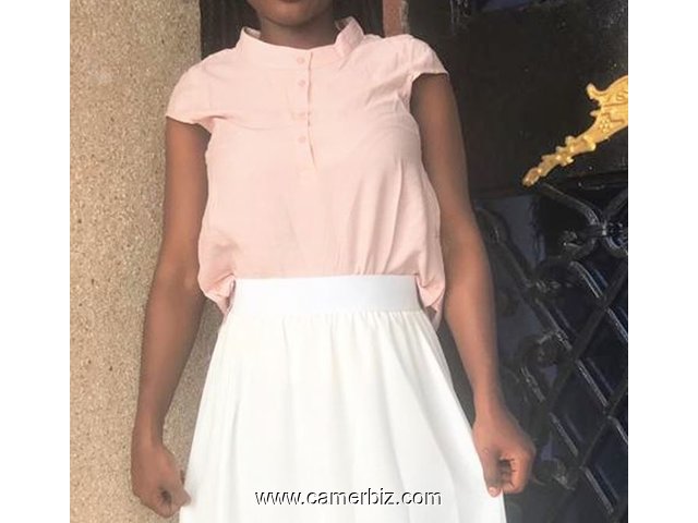 Blouse classe sans manche couleur pêche T38 4.990 F CFA (CB0029) - 16905