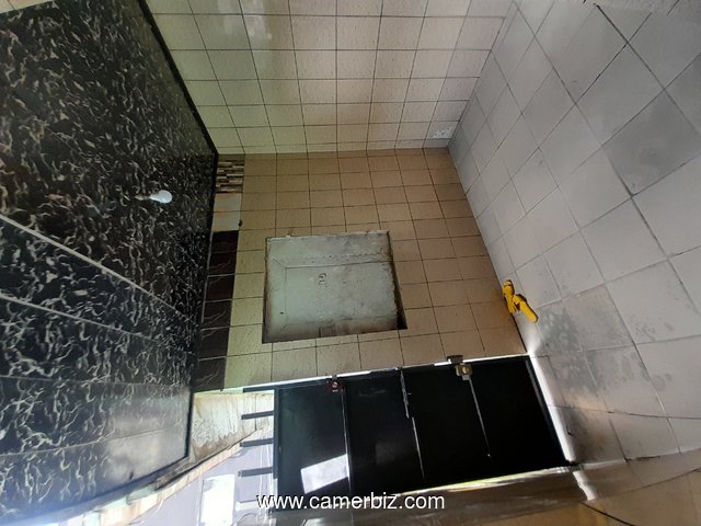Maison a vendre a akwa nord a cote du goudron de l'axe principale  - 35921