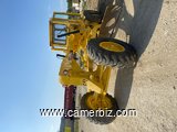 neveleuse caterpillar 140 H  - 9858